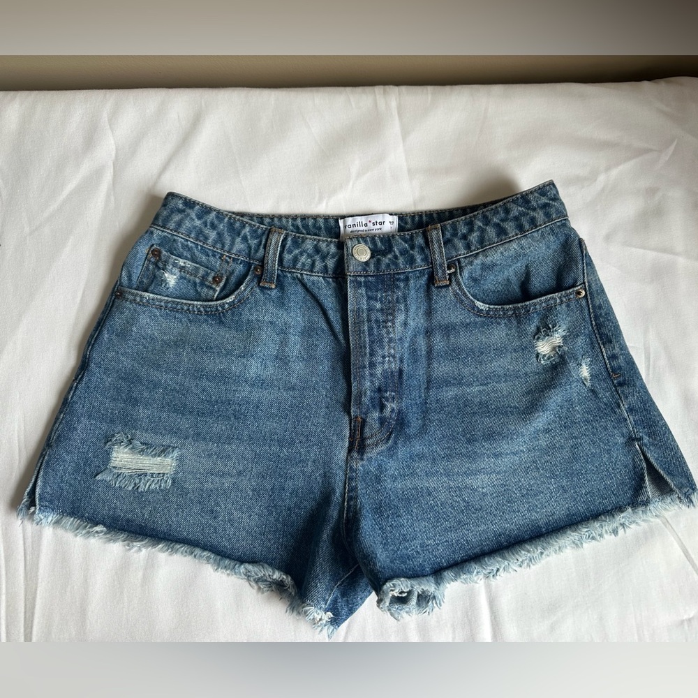 Vanilla Star Blue Jean Shorts Distressed Hem. Good condition. Size 5.